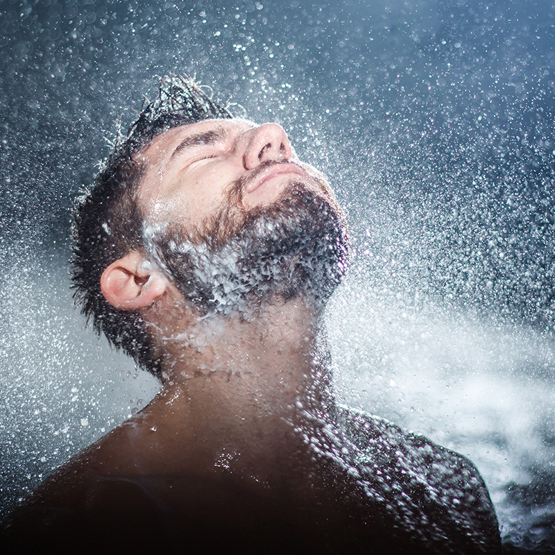 Beard Spraying Water During Washing